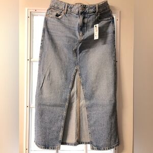 Brand new GARAGE Denim skirt with front slit.